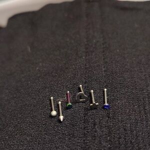 New 18 guage sterile nose rings